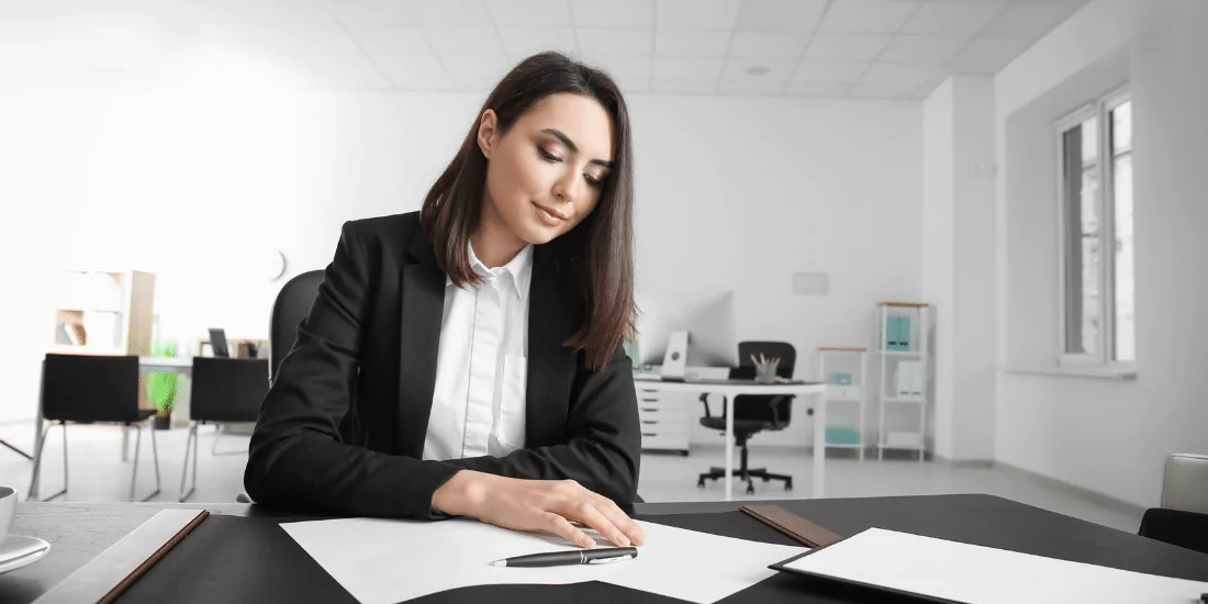 a female attorney reviewing an ERISA plan document in a personal injury case.